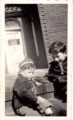 Bernie Sanders (left) and his older brother, Larry, on their street in Brooklyn. They grew up Jewish, but the family was not deeply religious, Larry Sanders said. - COURTESY OF LARRY SANDERS