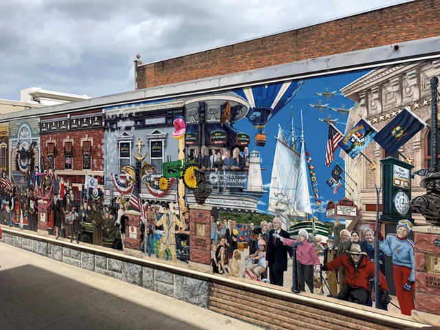 "Everyone Loves a Parade!" mural in downtown Burlington - SADIE WILLIAMS
