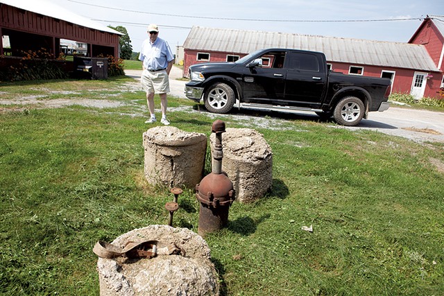 John Belter standing by the contaminated well on his South Burlington farm - KEVIN MCCALLUM