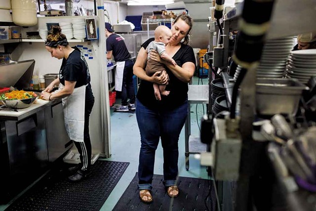 Cara Chigazola Tobin and her 3-month-old son, Gus Tobin, in the Honey Road kitchen - OLIVER PARINI