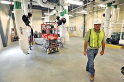Mike Stevens in the new heating and cooling plant of the new Waterbury complex - JEB WALLACE-BRODEUR