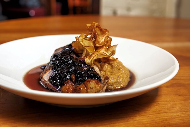 Duck with toasted polenta, a blueberry glaze and sunchoke chips at Sweetwaters - OLIVER PARINI