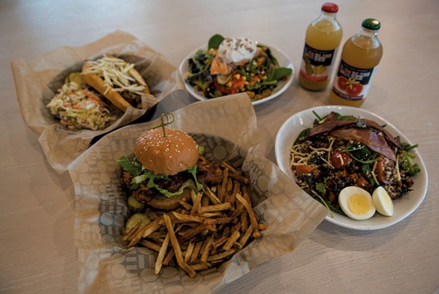 Clockwise from bottom: crispy chicken sandwich with hand-cut fries, Vermont hot dog, salmon salad, Bliss Bee sodas and a Sunrise grain bowl - FILE: DARIA BISHOP