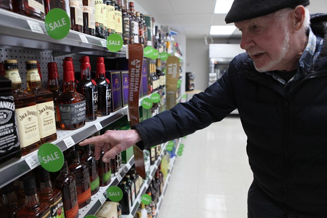 Bill Keogh shops for booze at the Camp Johnson base exchange - KEVIN MCCALLUM