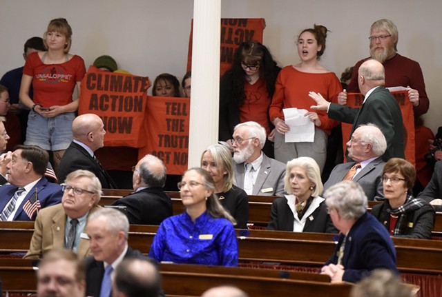 Climate protesters interrupting Gov. Phil Scott's State of the State address - JEB WALLACE-BRODEUR
