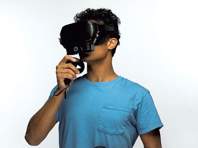 Experiencing scent-enabled virtual reality via the ION device attached to a standard headset - COURTESY OF OVR TECHNOLOGY