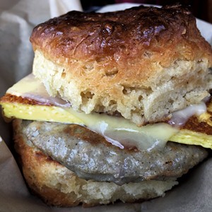 Breakfast sandwich on a maple biscuit at August First Bakery - MELISSA PASANEN