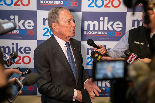 Michael Bloomberg takes questions from reporters on Monday in Burlington - LUKE AWTRY