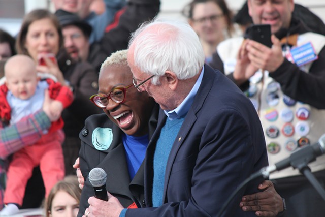 Sen. Bernie Sanders embracing national campaign cochair Nina Turner in Cedar Rapids, Iowa - PAUL HEINTZ
