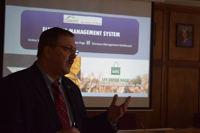 Secretary of State Jim Condos displays a new online voter-registration system Thursday at Montpelier City Hall. - TERRI HALLENBECK