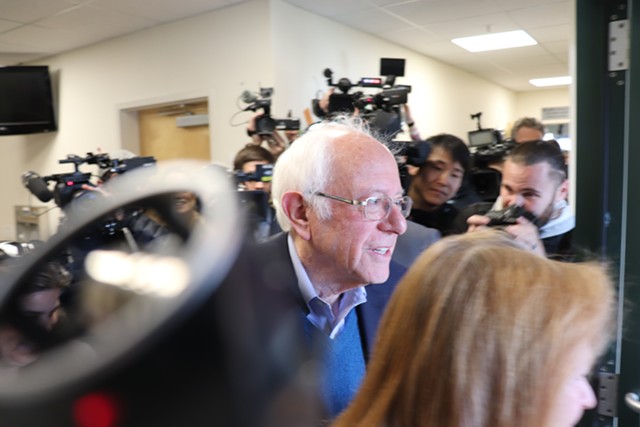 Sanders leaving the polls - DEREK BROUWER