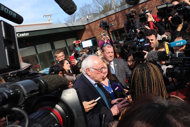 Bernie Sanders speaking to reporters outside the polls in Burlington on Tuesday - DEREK BROUWER