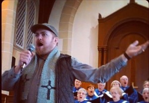 Adam Hall and choir - COURTESY OF SIMONE O'FLAHERTY