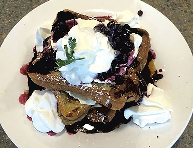 Carriage House Café & Grill's blueberry-stuffed waffles - COURTESY OF CARRIAGE HOUSE CAFÉ & GRILL