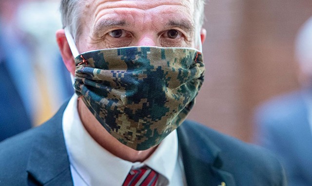 Gov. Phil Scott wearing a face mask at an April press conference in Montpelier - FILE: JEB WALLACE-BRODEUR