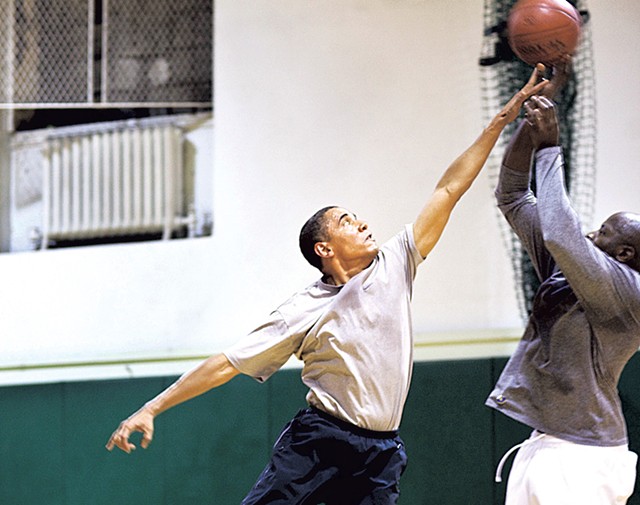President Barack Obama playing basketball with personal aide Reggie Love - COURTESY OF PETE SOUZA