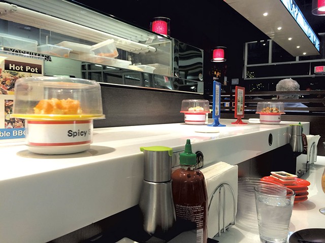 Conveyor belt sushi at A Cuisine - JOHN JAMES