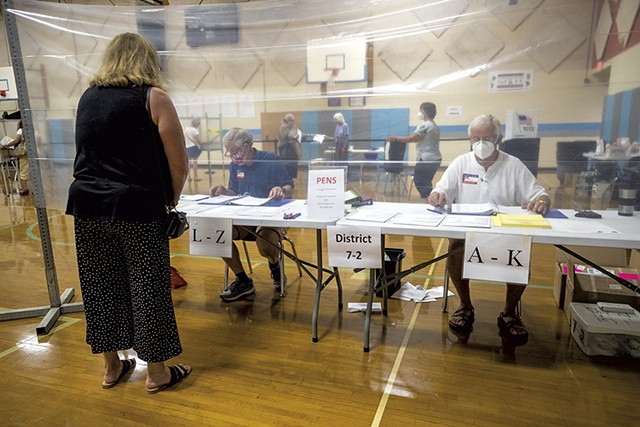 Voting in-person in South Burlington last summer - FILE: JAMES BUCK