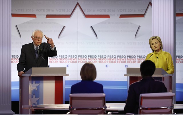 Sen. Bernie Sanders and former secretary of state Hillary Clinton debate Thursday night in Milwaukee, Wisconsin. - AP PHOTO/MORRY GASH