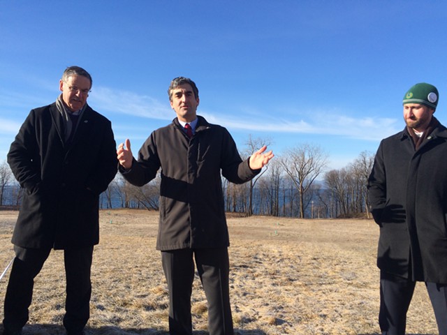 From left, Vermont Land Trust president Gil Livingston, Mayor Miro Weinberger and Parks, Recreation & Waterfront Director Jesse Bridges stand in front of the future parkland. - ALICIA FREESE