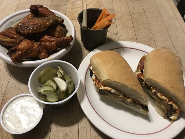 Eggplant hoagie and chicken wings from Prohibition Pig, with a hemp joint from Zenbarn Farms - SALLY POLLAK ©️ SEVEN DAYS