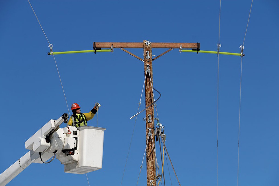 Lineman Cody Crowe upgrading a Green Mountain Power line in Eden - KEVIN MCCALLUM ©️ SEVEN DAYS