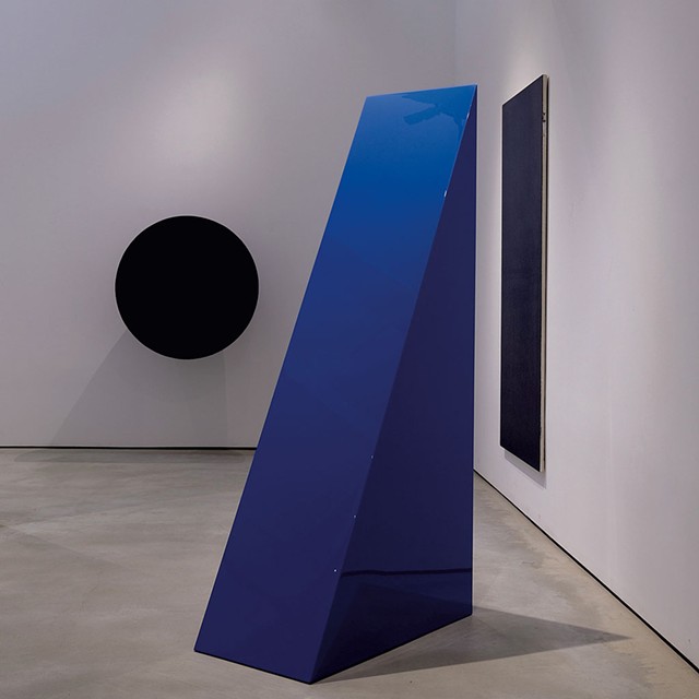 From left: "Untitled" by Anish Kapoor, "Untitled (Blue Wedge)" by John McCracken and "Untitled" by Olivier Mosset - COURTESY OF JEFFREY NINTZEL AND HALL ART FOUNDATION