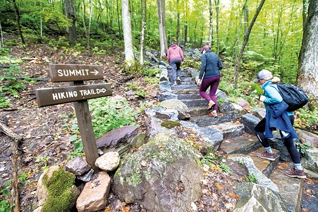 Mount Philo hikers climbing a new stone staircase - JAY ERICSON