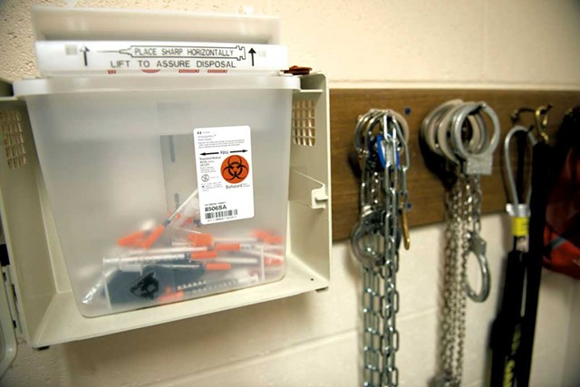 A police evidence locker in Rutland containing needles used to inject heroin - CALEB KENNA