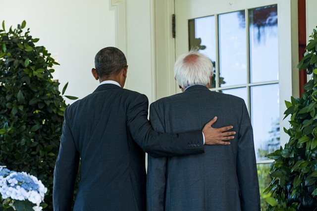 President Barack Obama and Sen. Bernie Sanders walk past the Rose Garden Thursday on their way to an Oval Office meeting. - PETE MAROVICHI/POOL/SIPA USA, VIA ASSOCIATED PRESS