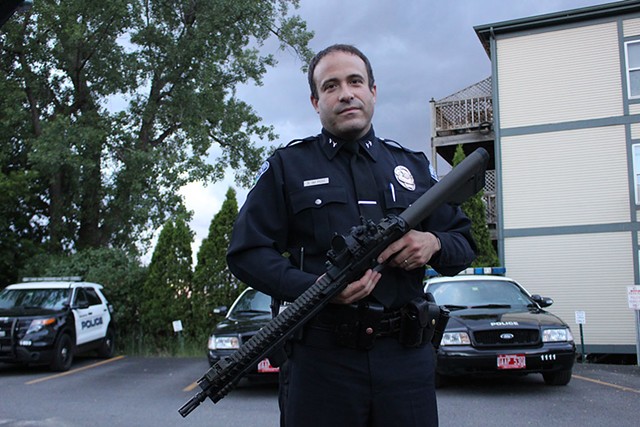 Burlington Police Chief Brandon del Pozo on Monday with the AR-15 - PAUL HEINTZ
