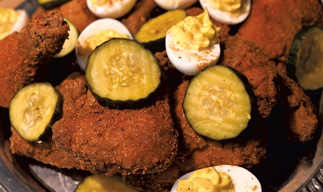Fried chicken with pickles and deviled eggs - JON OLENDER