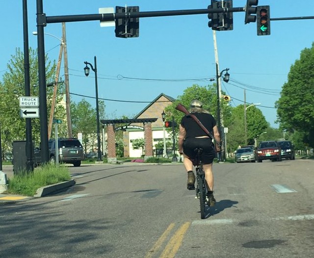 A cyclist identified as Malcolm Tanner at North Winooski and Riverside Avenues in May. - COURTESY: DAN BARNES