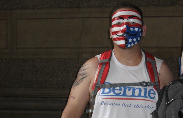 A Bernie bro at Philadelphia City Hall wearing a T-shirt with a memorable logo. - KEVIN J. KELLEY