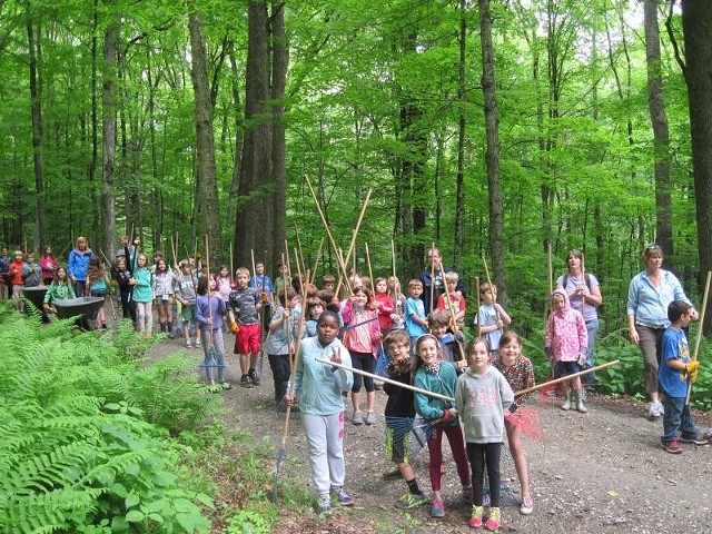Second graders from Woodstock, Stockbridge and Killington Elementary Schools raking a trail at the Marsh-Billings-Rockefeller National Historical Park - J HALEY/NATIONAL PARK SERVICE