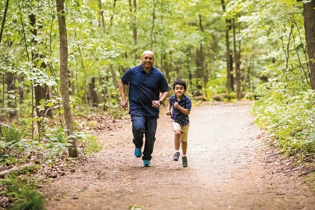 Rija Ramahatra and his son, Math&eacute;o, - at Niquette Bay State Park in Colchester - CAT CUTILLO