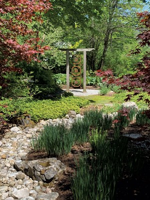 A  1930 art deco gate from France in the Japanese-inspired garden - AMY LILLY