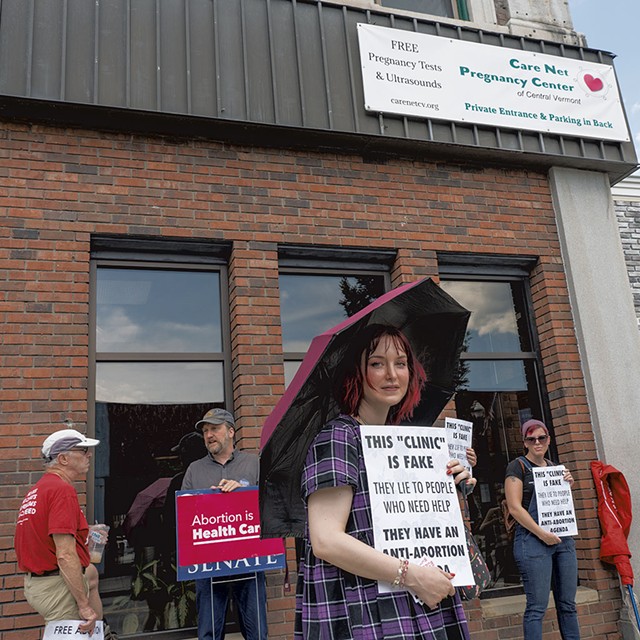 Julia Zimmerman with  other picketers at Care Net Pregnancy Center of Central Vermont in Barre - TERRY J. ALLEN