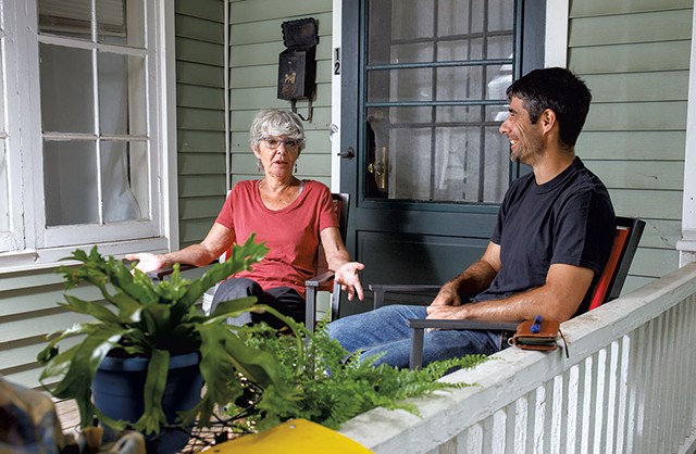 Liam Madden visiting with his mother, Oona, on her porch in Brattleboro - ZACH STEPHENS