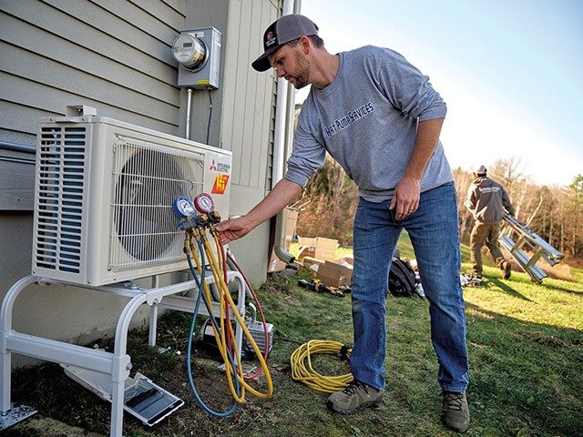 James Zeno of Heat Pump Services installing a heat pump in Charlotte - BEAR CIERI