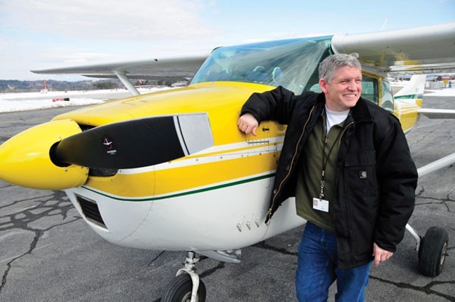 State aeronautics administrator Guy Rouelle with Vermont's Cessna 182 - FILE: JEB WALLACE-BRODEUR