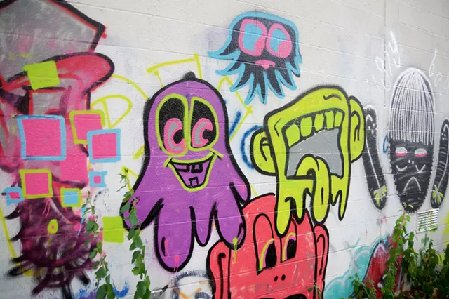Champlain College Students Color South End Wall
