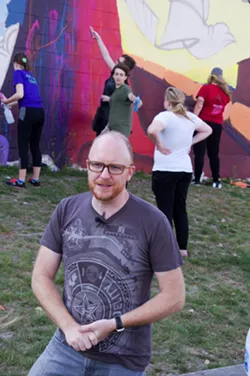 Champlain College Students Color South End Wall