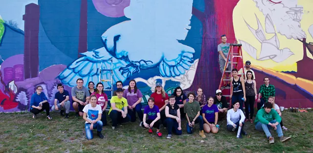 Champlain College Students Color South End Wall