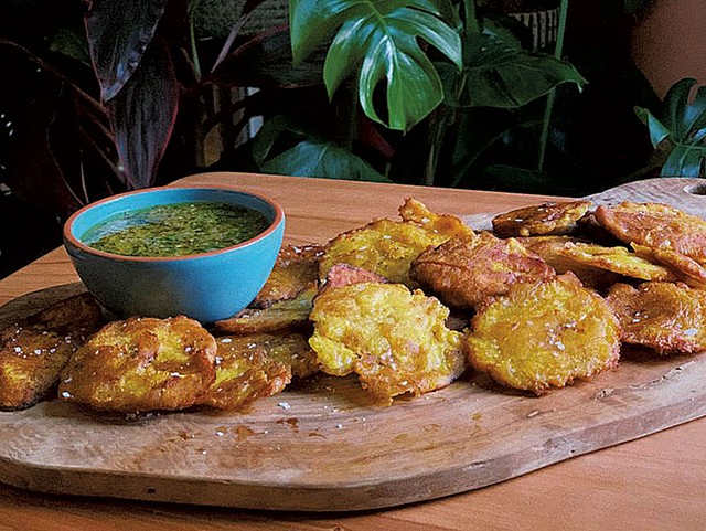 Tostones con mojo (fried plantains with green herb sauce) - COURTESY