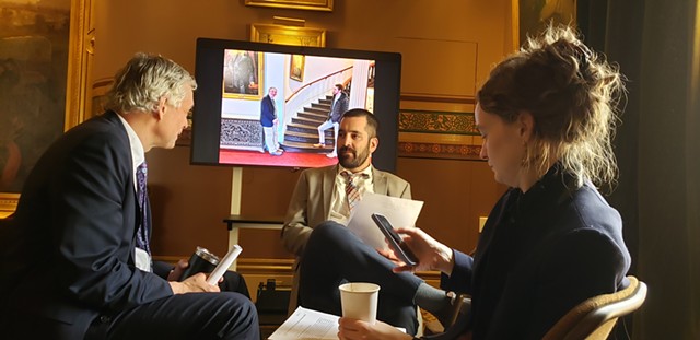 Senate Secretary John Bloomer discussing adjournment options with House and Senate chiefs of staff - KEVIN MCCALLUM