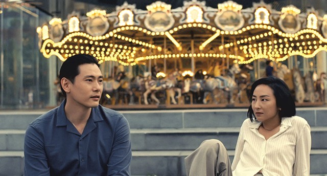 Yoo and Lee play childhood sweethearts who reconnect after being separated by an ocean in Song's quietly thought-provoking drama. - COURTESY OF A24