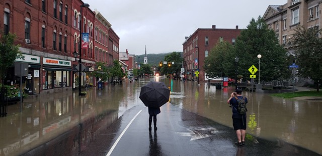 Downtown Montpelier as the Winooski River rose on Monday evening - KEVIN MCCALLUM ©️ SEVEN DAYS