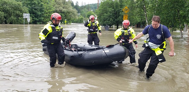 A swift water rescue team from New York State at work in Montpelier - KEVIN MCCALLUM ©️ SEVEN DAYS