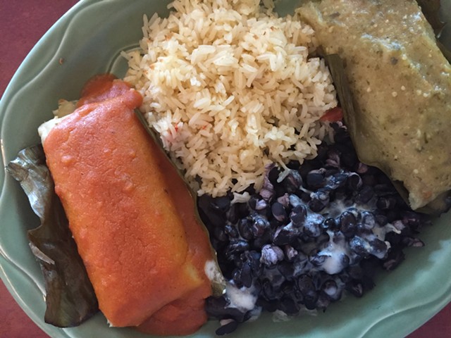 Salvadoran tamales (beef, left; chicken, right), rice and beans - HANNAH PALMER EGAN